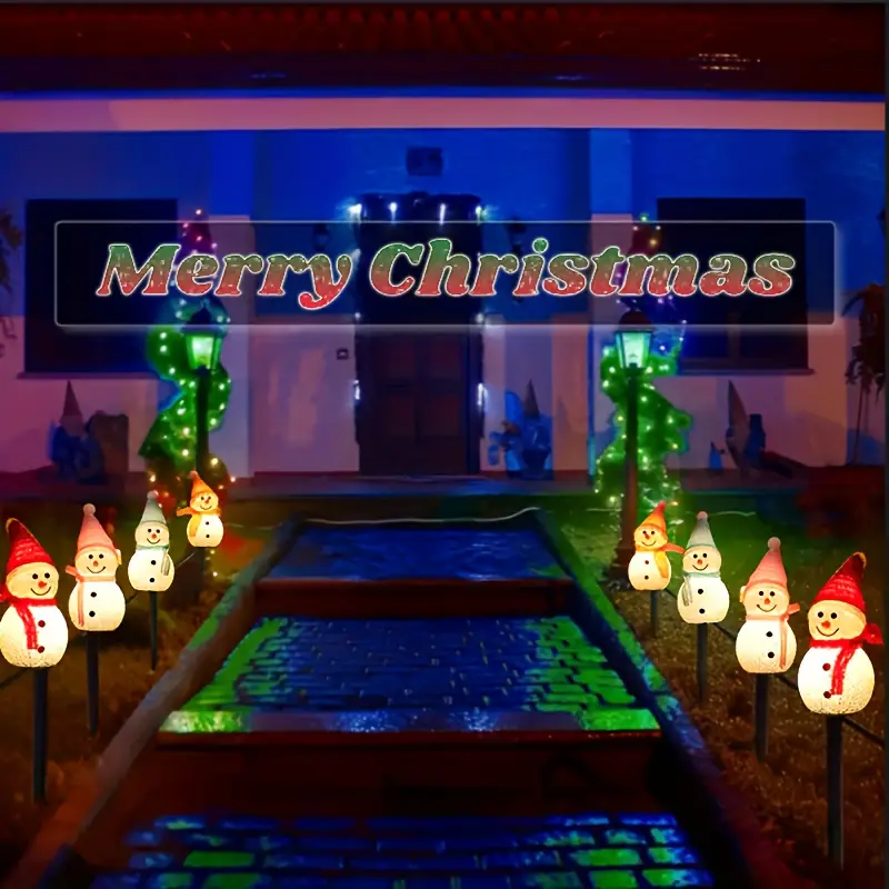 Outdoor Lighting For Christmas - A set of four-piece solar snowman